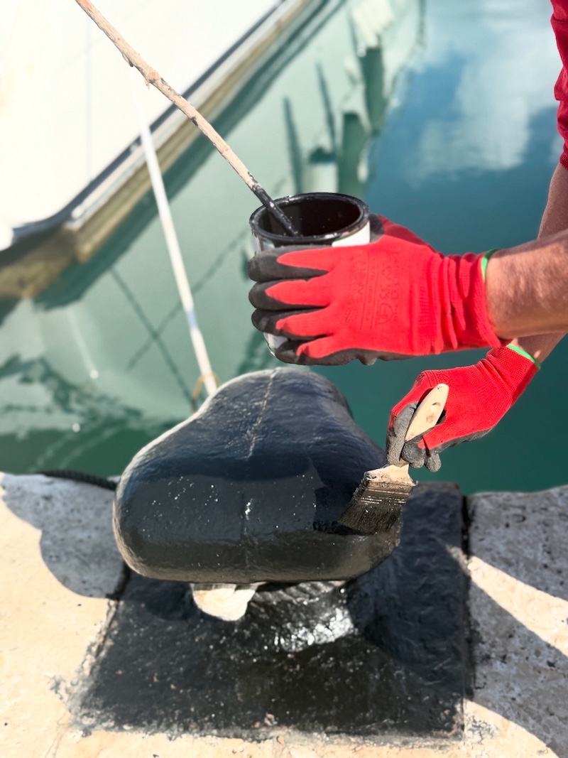 The installation of new mooring lines and rings on Pier C 